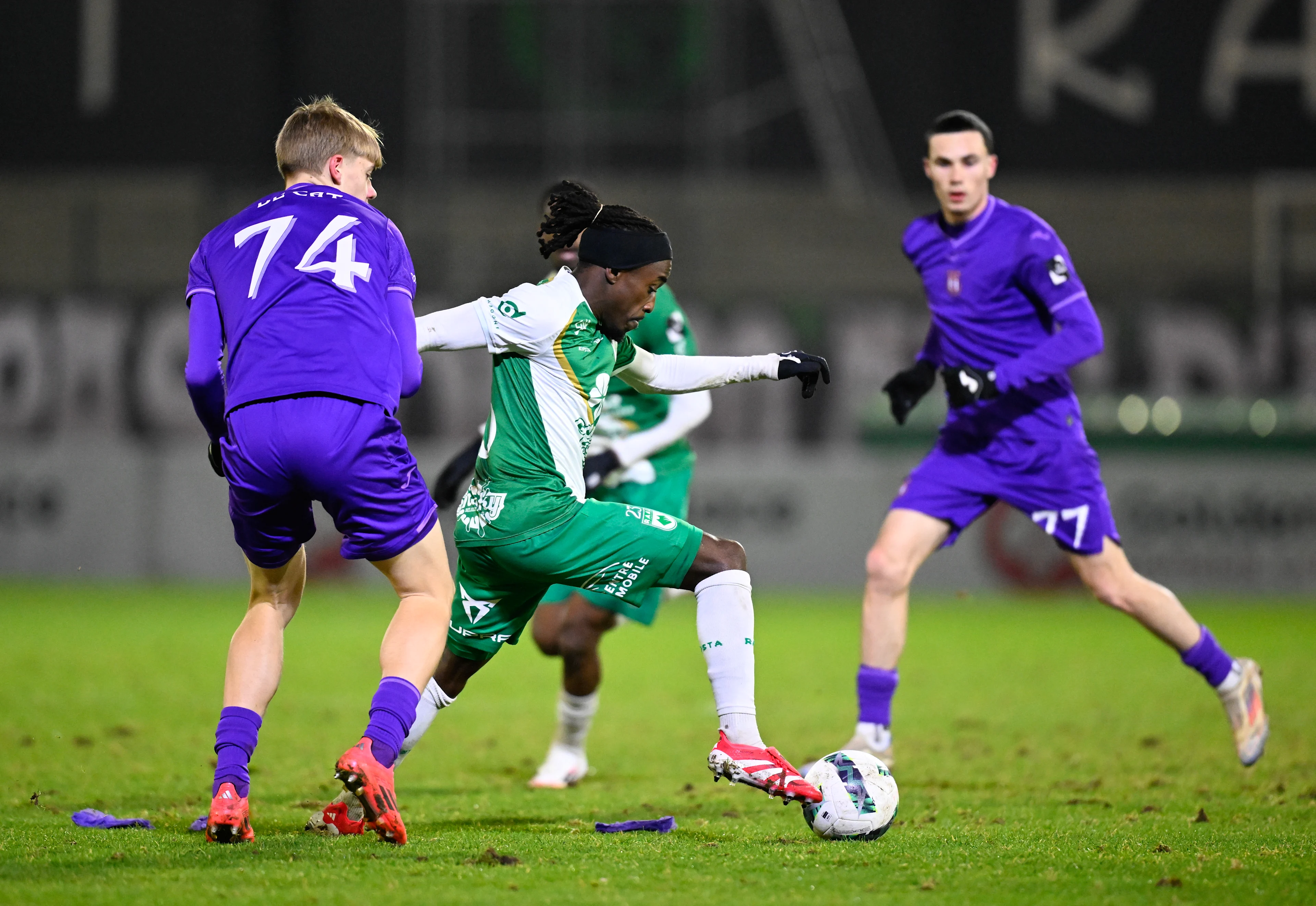 RSCA Futures' Nathan De Cat and RAAL's Joel Ito pictured in action during a soccer match between RAAL La Louviere and RSCA Futures (U21), Saturday 18 January 2025 in La Louviere, on day 18 of the 2024-2025 'Challenger Pro League' 1B second division of the Belgian championship. BELGA PHOTO JOHN THYS