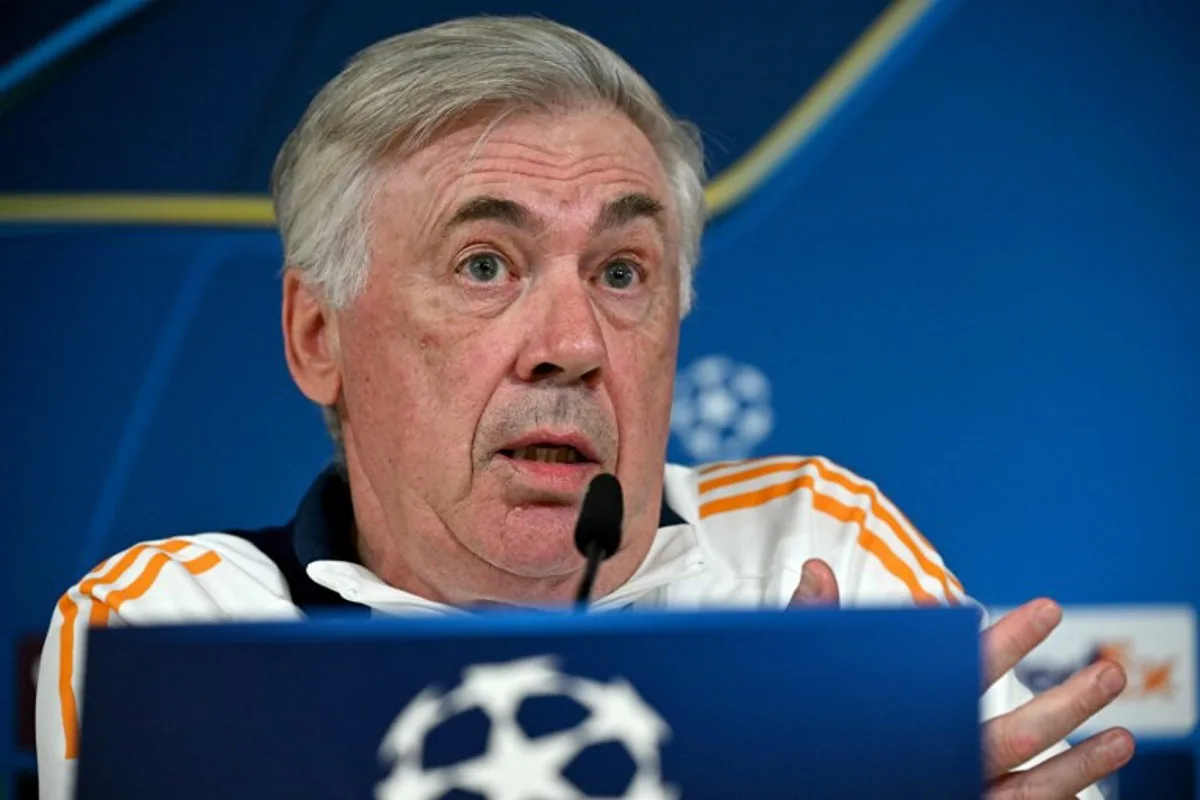 Real Madrid's Italian coach Carlo Ancelotti gives a press conference on the eve of their UEFA Champions League football match against Manchester City at Real Madrid Sports City in Valdebebas, in the outskirts of Madrid, on February 18, 2025.  JAVIER SORIANO / AFP