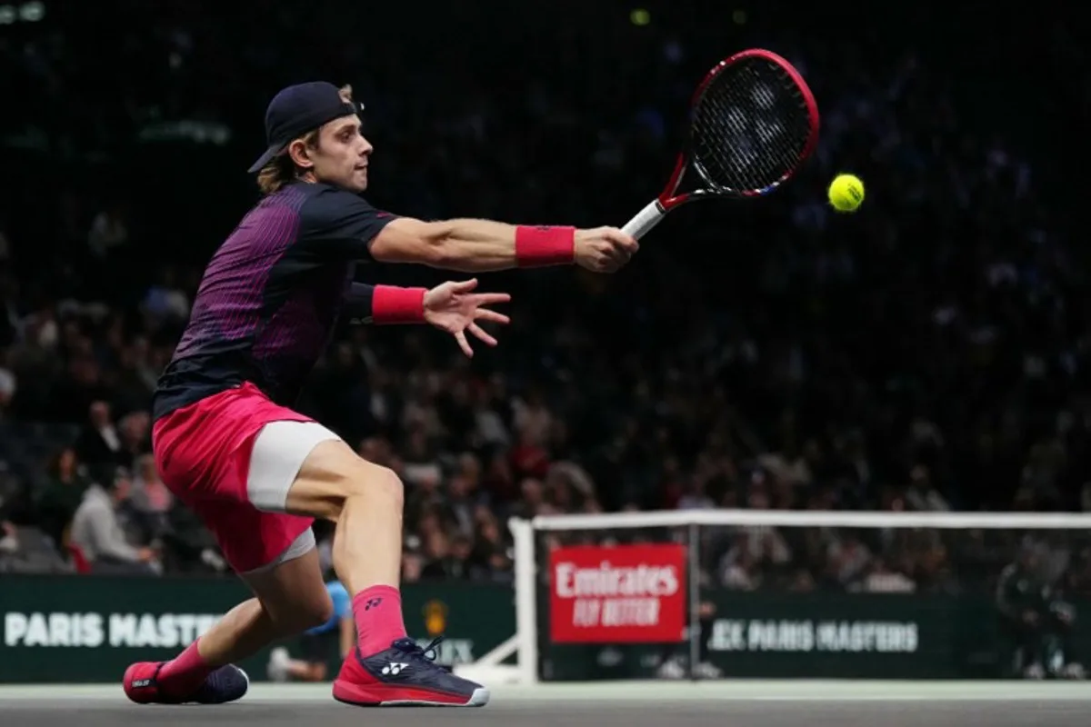 Belgium's Zizou Bergs plays a forehand return to France's Richard Gasquet during their men's singles match on day two of the Paris ATP Masters 1000 tennis tournament at the Accor Arena - Palais Omnisports de Paris-Bercy - in Paris on October 29, 2024.  Dimitar DILKOFF / AFP