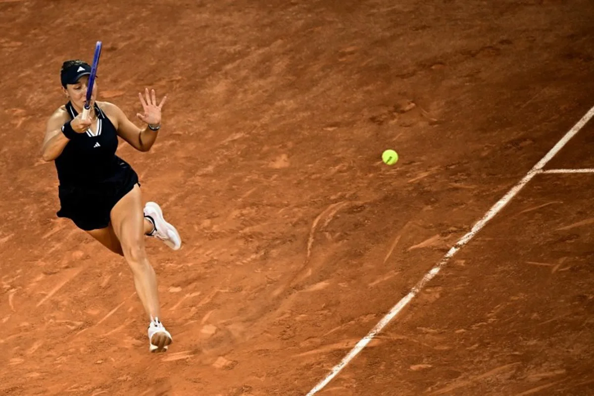 US Jessica Pegula plays a forehand return to Australia's Kimberly Birrell during their women's singles match on day 3 of the French Open tennis tournament on Court Simonne-Mathieu at the Roland-Garros Complex in Paris on May 26, 2026. JULIEN DE ROSA / AFP