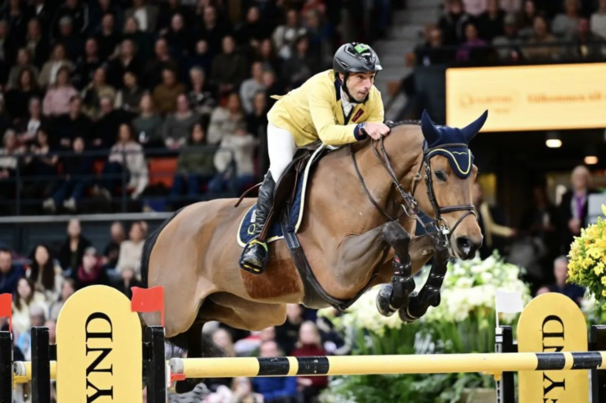 Brazil's Yuri Mansur on the horse Miss Blue-Saint Blue Farm competes during the World Cup jumping at the Gothenburg Horse Show in Scandinavium in Gothenburg, Sweden on February 23, 2025. Bjorn LARSSON ROSVALL / TT News Agency / AFP