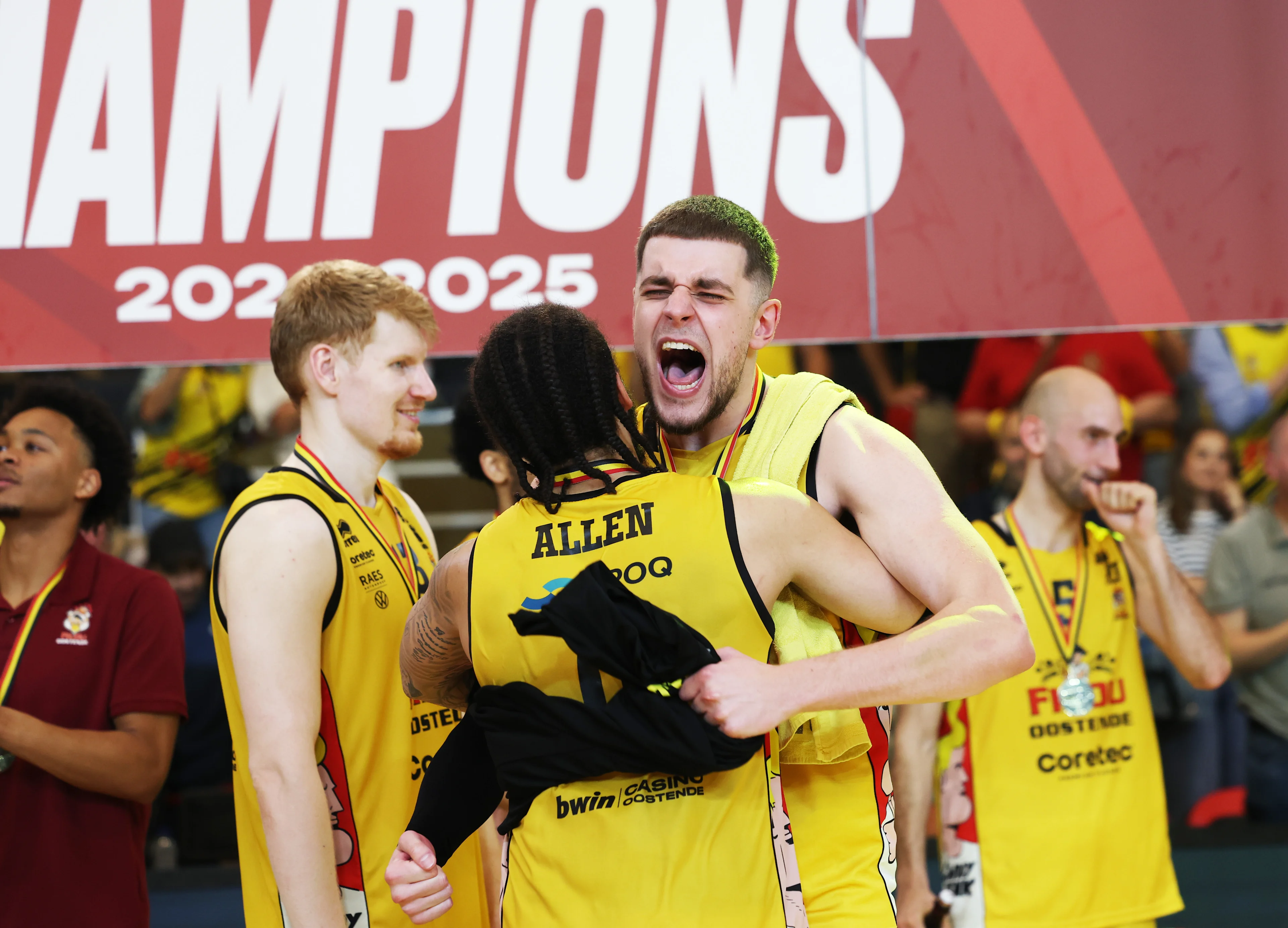 Oostende's Timmy Allen and Oostende's Haris Bratanovic celebrate after winning the Belgian BNXT championship, Saturday 07 June 2025 in Oostende. BC Oostende defeats Kangoeroes Mechelen 100-76 in the fourth game of the best-of-5 finals in the playoffs of the 'BNXT League' Belgian/ Dutch first division basket championship. BELGA PHOTO KURT DESPLENTER