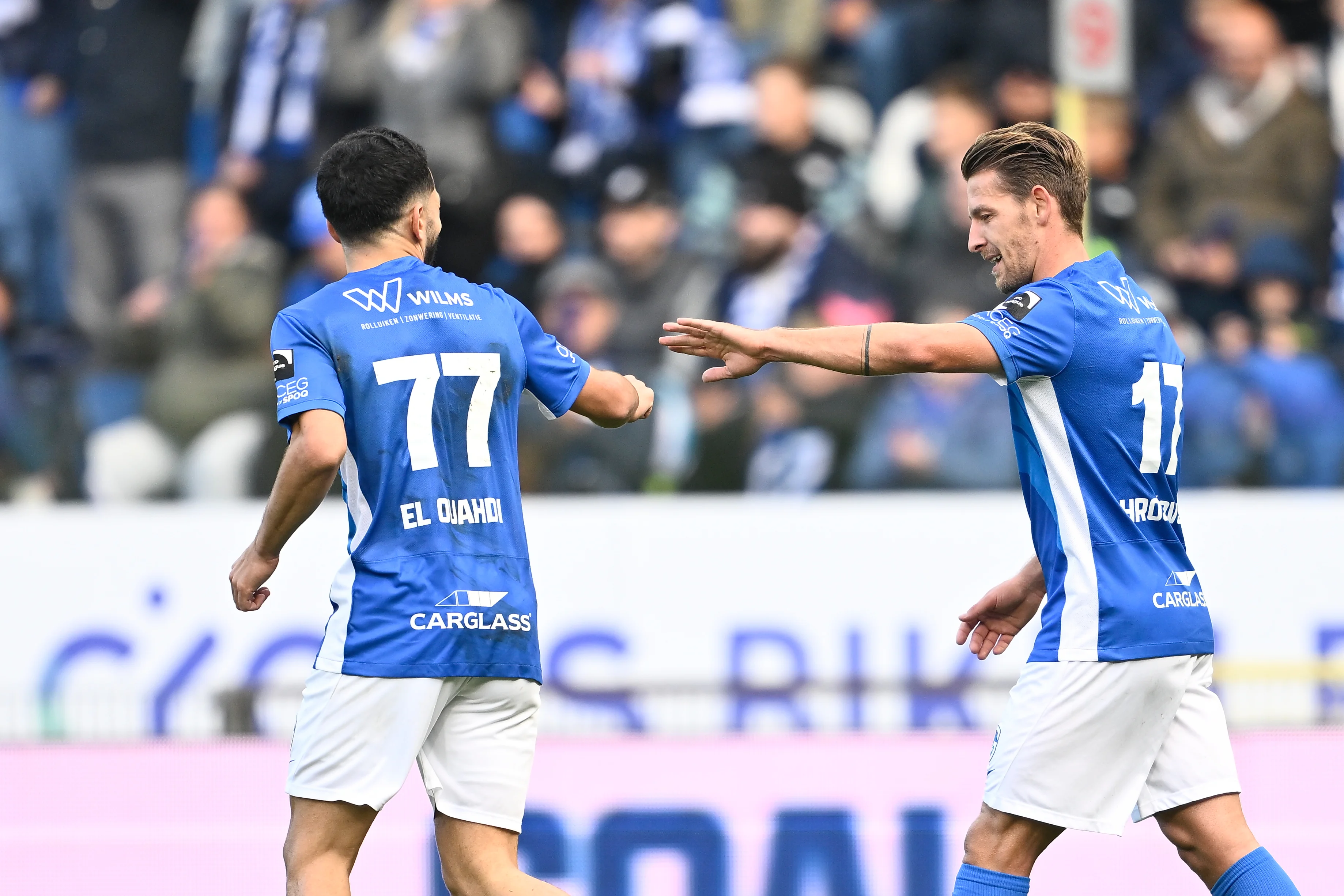 Genk's Zakaria El Ouahdi and Genk's Patrik Hrosovsky celebrate after scoring during a soccer match between KRC Genk and Royal Antwerp FC, Sunday 03 November 2024 in Genk, on day 13 of the 2024-2025 season of the 'Jupiler Pro League' first division of the Belgian championship. BELGA PHOTO JOHAN EYCKENS