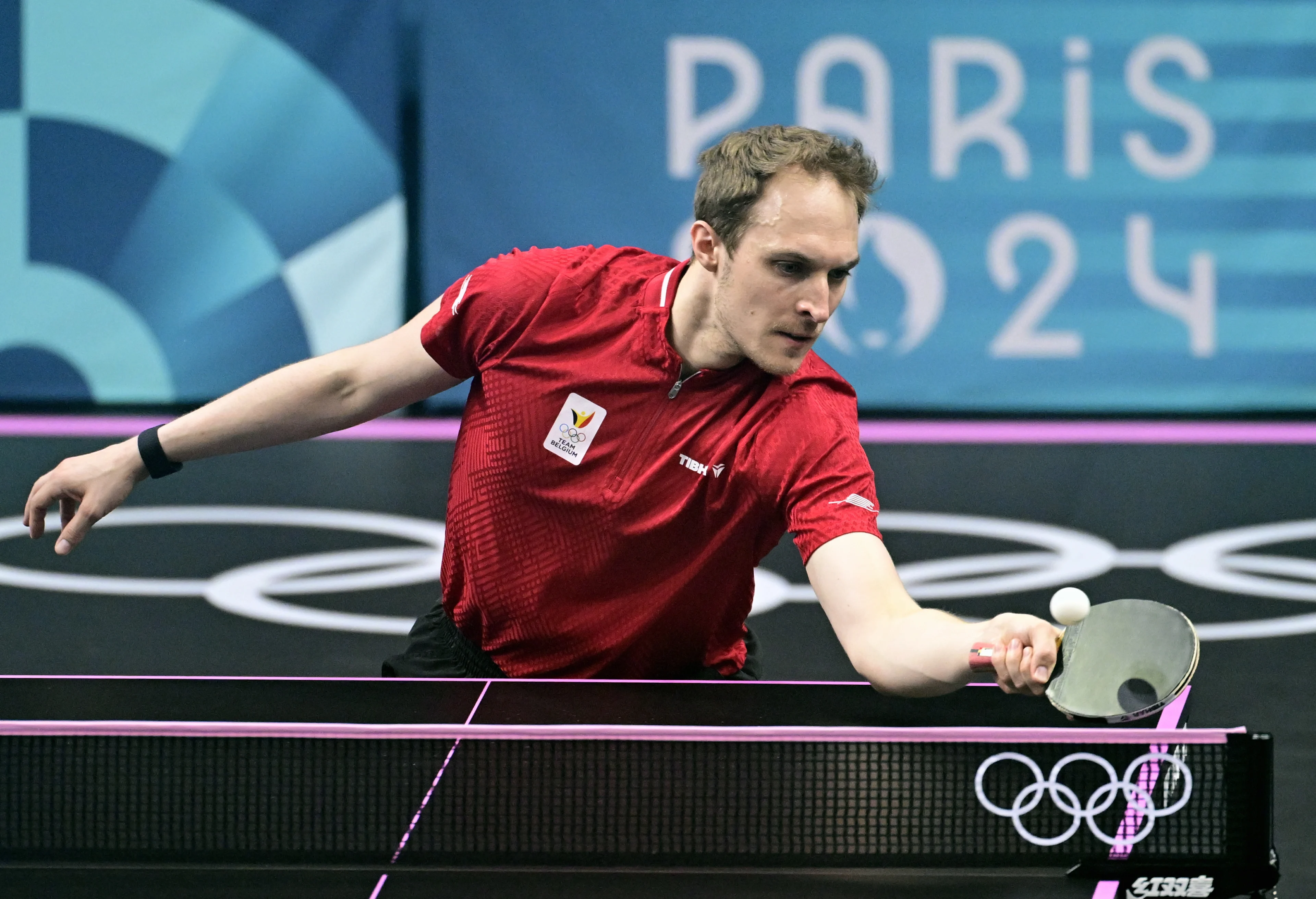 Belgian table tennis player Cedric Nuytinck pictured in action during a table tennis against Swedish Moregardh, in the round of 64 of the men's singles competition at the Paris 2024 Olympic Games, on Saturday 27 July 2024 in Paris, France. The Games of the XXXIII Olympiad are taking place in Paris from 26 July to 11 August. The Belgian delegation counts 165 athletes in 21 sports. BELGA PHOTO LAURIE DIEFFEMBACQ