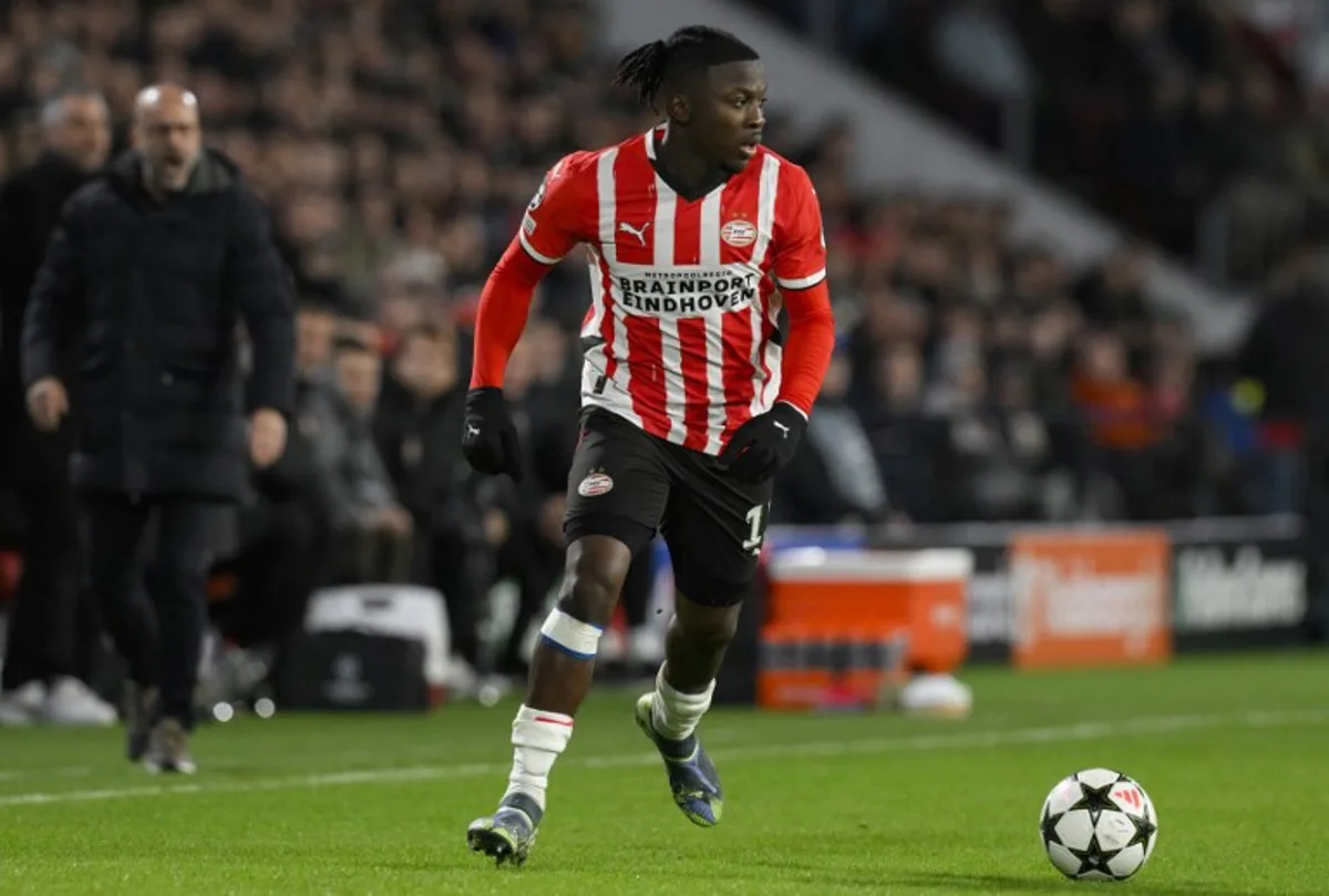 PSV Eindhoven's Belgian forward #11 Johan Bakayoko runs with the ball during the UEFA Champions League, League phase - Matchday 5, football match between PSV Eindhoven and Shakhtar Donetsk at the The Philips Stadion in Eindhoven, on November 27, 2024.  John THYS / AFP