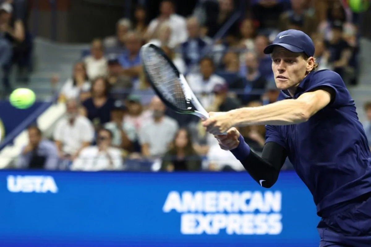 Italy's Jannik Sinner plays a forehand return to Kazakhstan's Alexander Bublik during their men's singles round of 16 tennis match on day nine of the US Open tennis tournament at the USTA Billie Jean King National Tennis Center in New York City, on September 1, 2025. CHARLY TRIBALLEAU / AFP