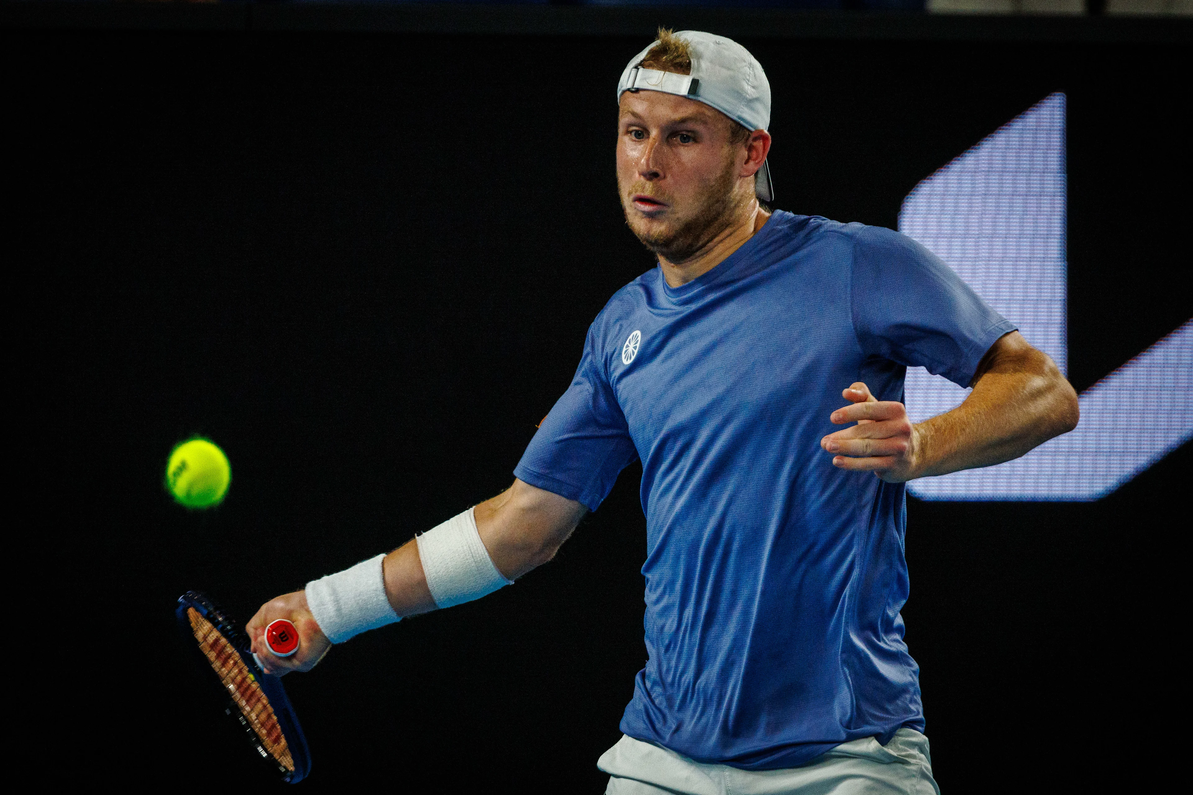 Belgian Gauthier Onclin pictured in action during a men's singles first round game between Belgian Onclin and American Opelka, at the 'Australian Open' Grand Slam tennis tournament, Sunday 12 January 2025 in Melbourne Park, Melbourne, Australia. The 2025 edition of the Australian Grand Slam takes place from January 12th to January 26th. BELGA PHOTO PATRICK HAMILTON