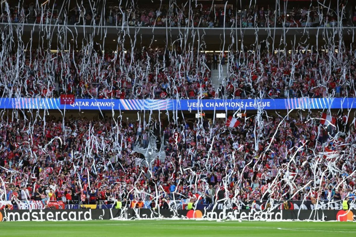 Atletico Madrid fans throw toilet paper before the UEFA Champions League semi-final first leg football match between Club Atletico de Madrid and Arsenal at the Metropolitano stadium in Madrid on April 29, 2026.  Thomas COEX / AFP