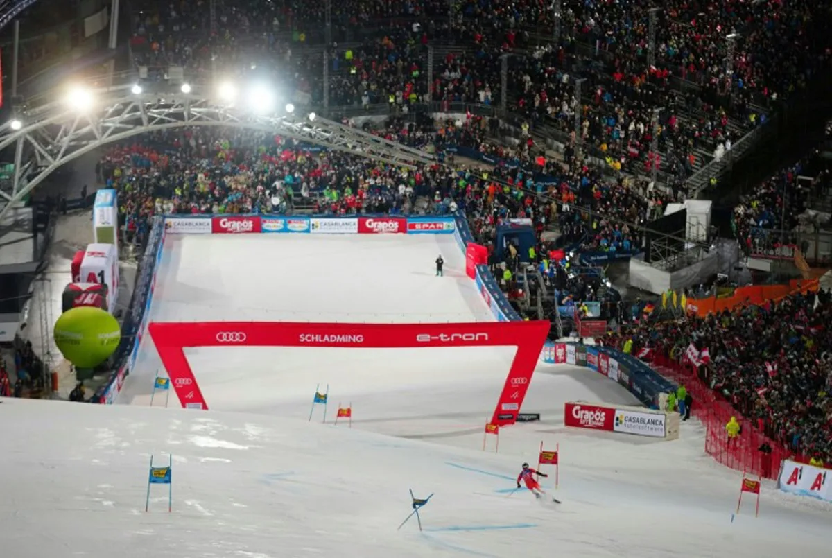 A general view shows the ski slope and the finish area as Switzerland's Marco Odermatt competes during the second run of the Men's Giant Slalom event of the FIS Alpine Skiing World Cup in Schladming, Austria, on January 23, 2024. GEORG HOCHMUTH / APA / AFP