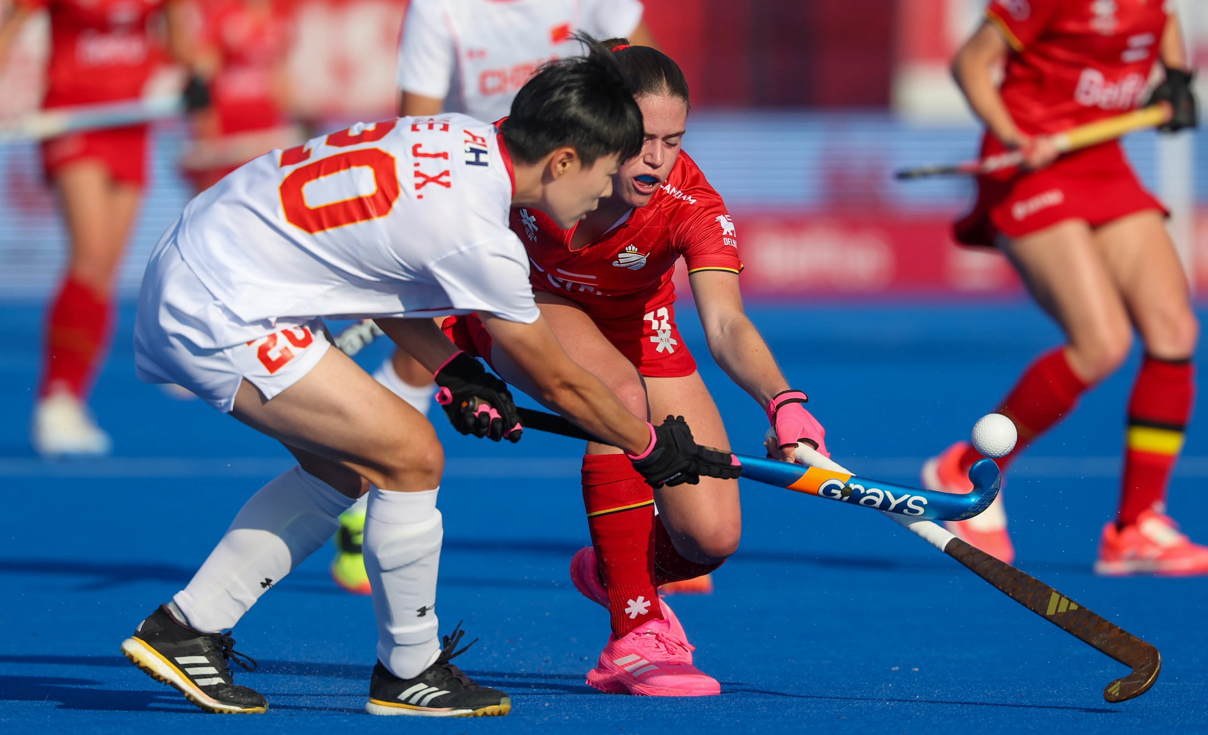 China's Jiangxin He and Belgium's Famke Van Heel fight for the ball during a hockey game between Belgian national team Red Panthers and China, Tuesday 16 June 2026 in Wavre, match 10/16 in the group stage of the women's FIH Pro League competition. BELGA PHOTO VIRGINIE LEFOUR