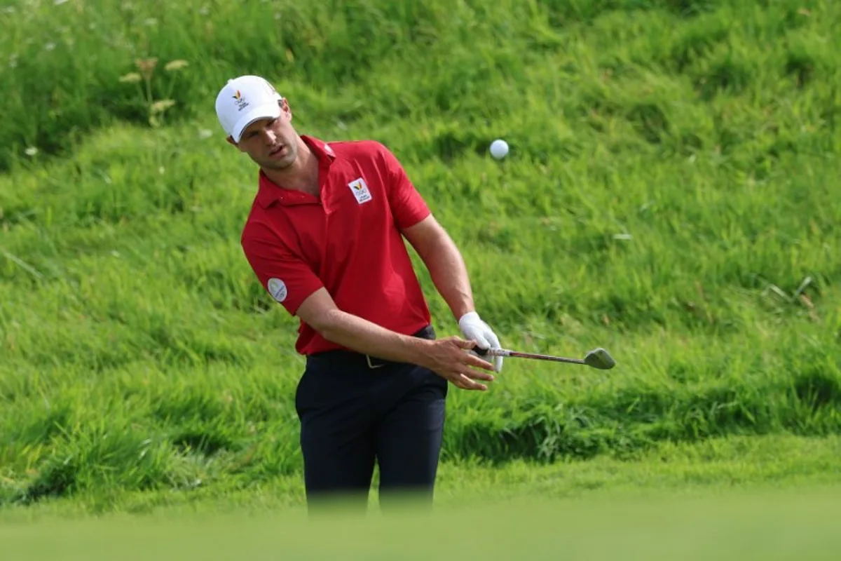 Belgium's Thomas Detry competes in round 4 of the men's golf individual stroke play of the Paris 2024 Olympic Games at Le Golf National in Guyancourt, south-west of Paris on August 4, 2024.   Emmanuel DUNAND / AFP