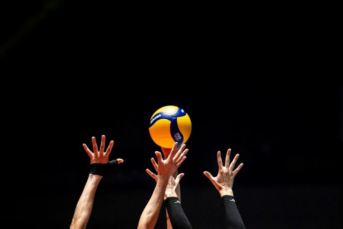 Puerto Rico's Paola Rojas (front L) and Brittany Abercrombie (front R) attempt to block a shot by Turkey's Ebrar Karakurt during the Volleyball World Cup 2023 women's match between Turkey and Puerto Rico in Tokyo on September 16, 2023.  Philip FONG / AFP