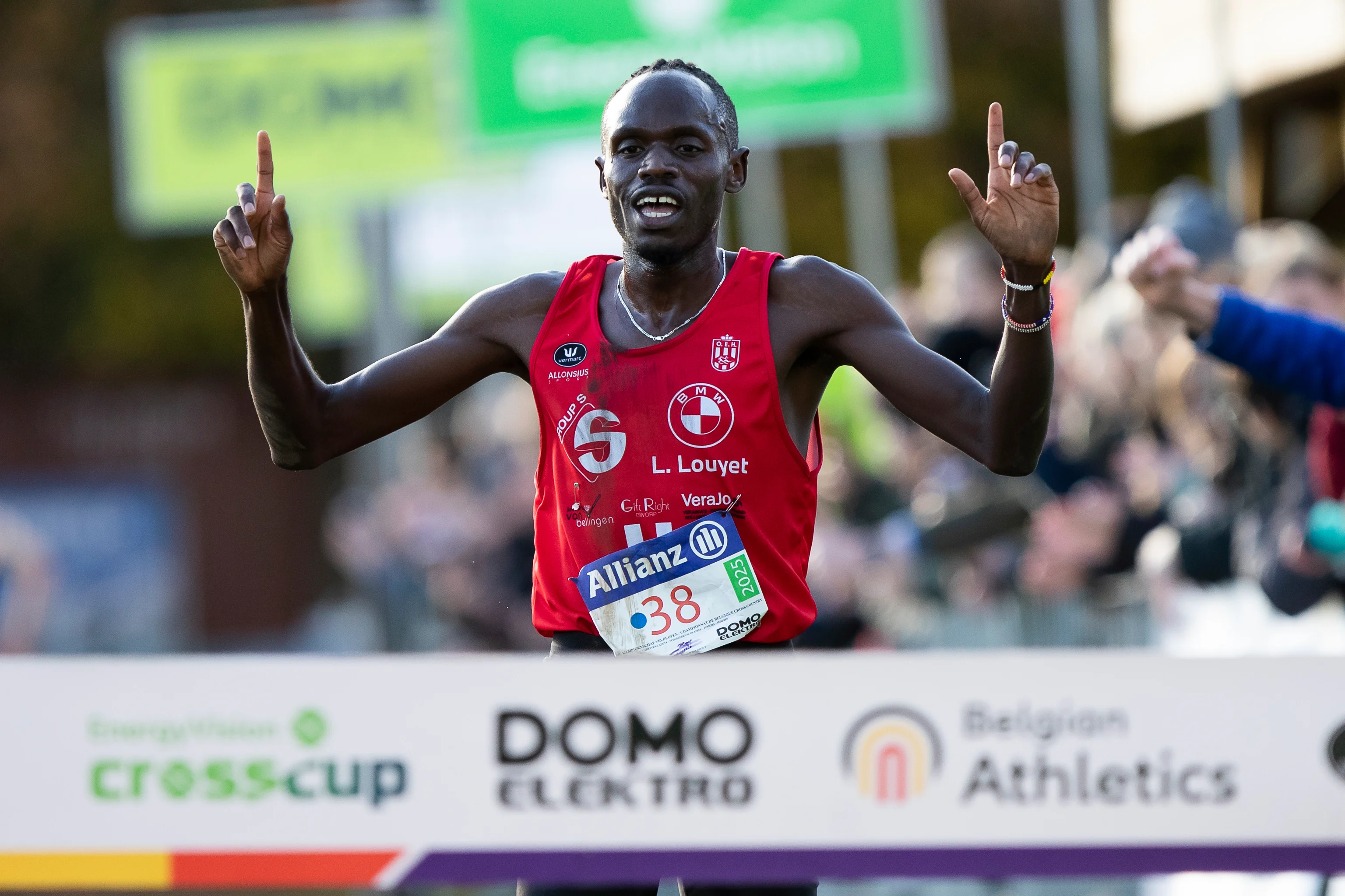 Belgian Isaac Kimeli celebrates as he crosses the finish line to win the men elite race of the CrossCup cross country running athletics event in Hulshout, the third stage of the CrossCup competition and the Belgian Championships, Sunday 17 November 2024. BELGA PHOTO KRISTOF VAN ACCOM