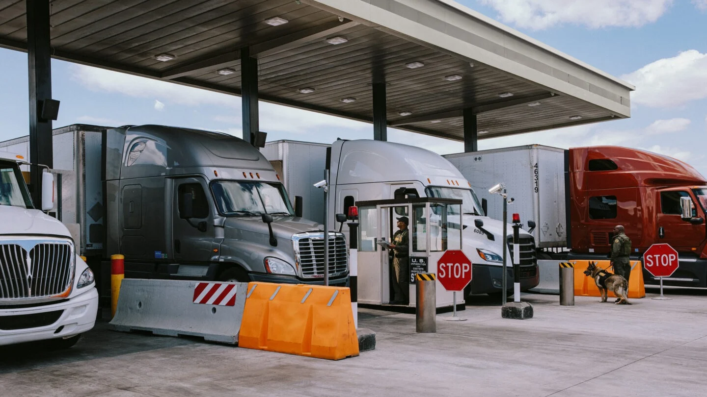 Trucks at border crossing.