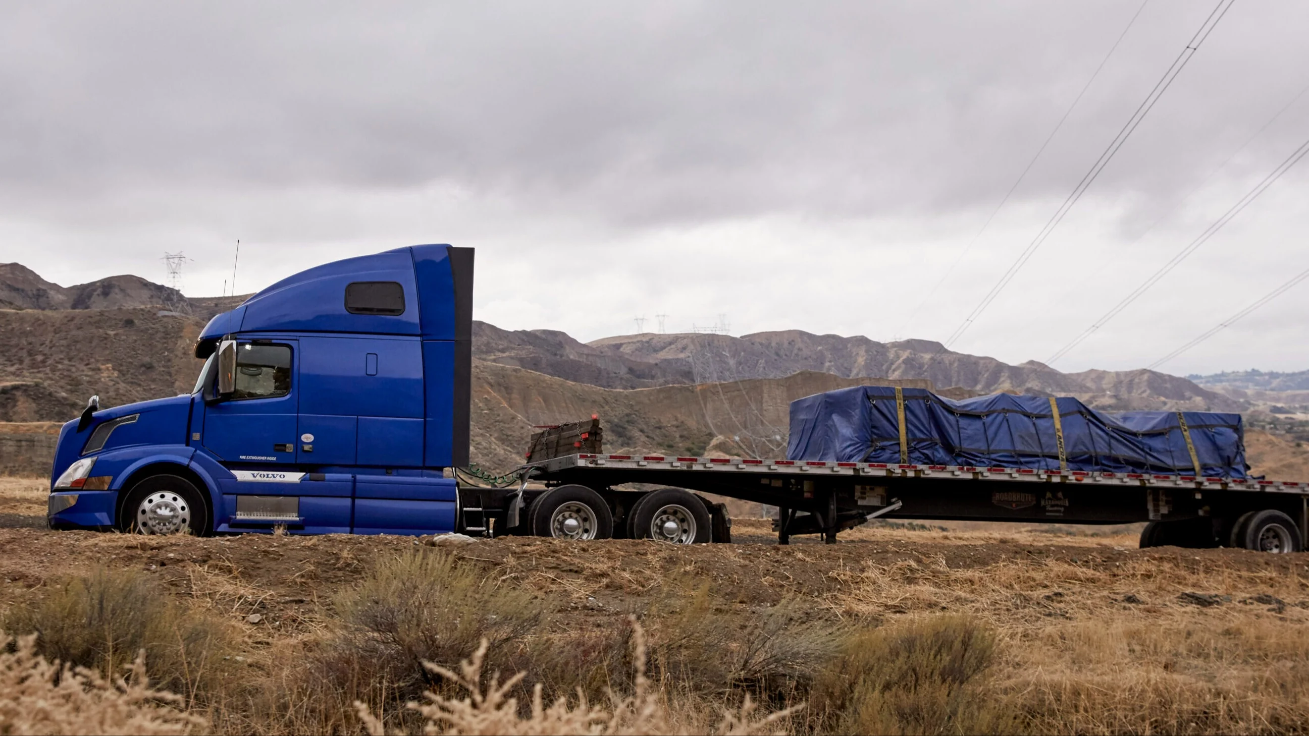 Blue flatbed truck.