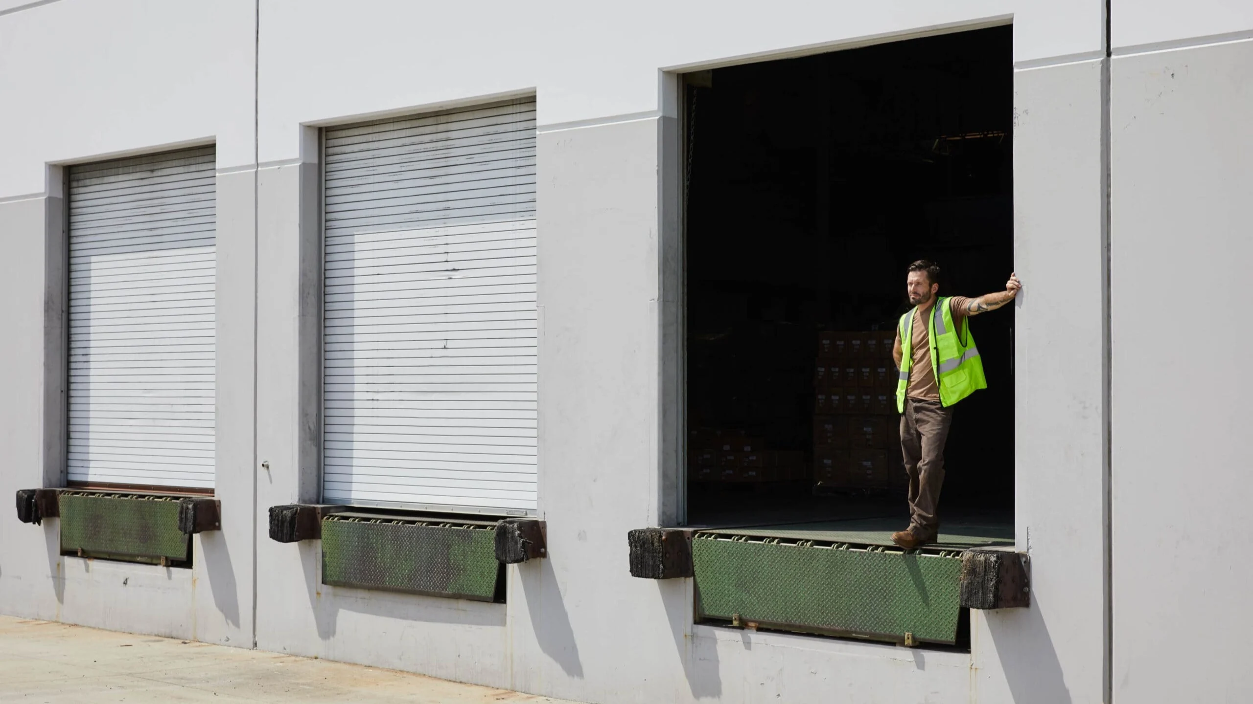 Man waiting on loading dock.