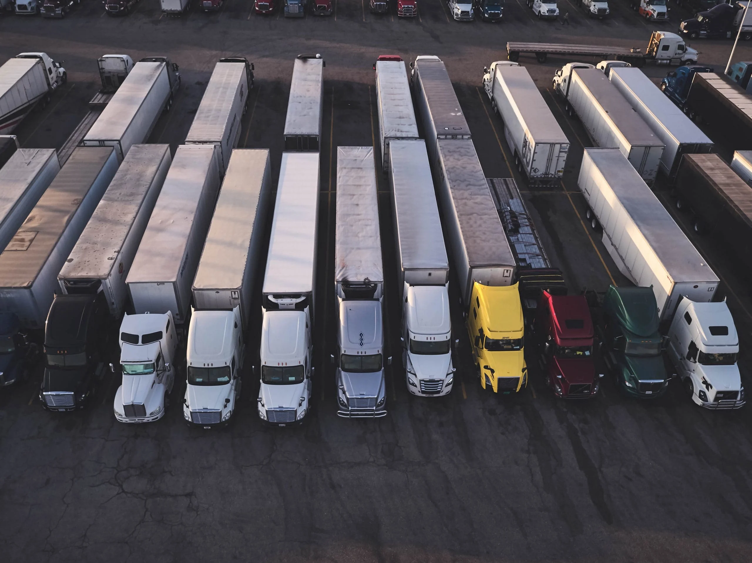Overhead view of rows of trucks.