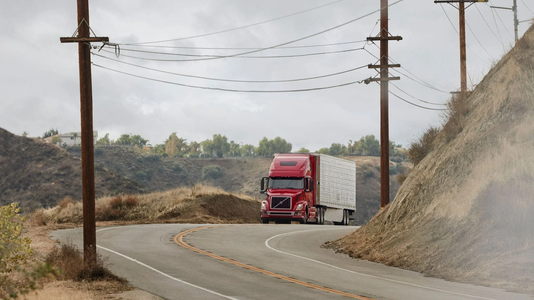 Truck driving on road.