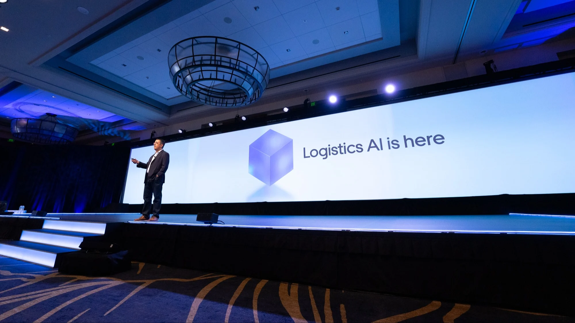 Man giving a speech at a conference.