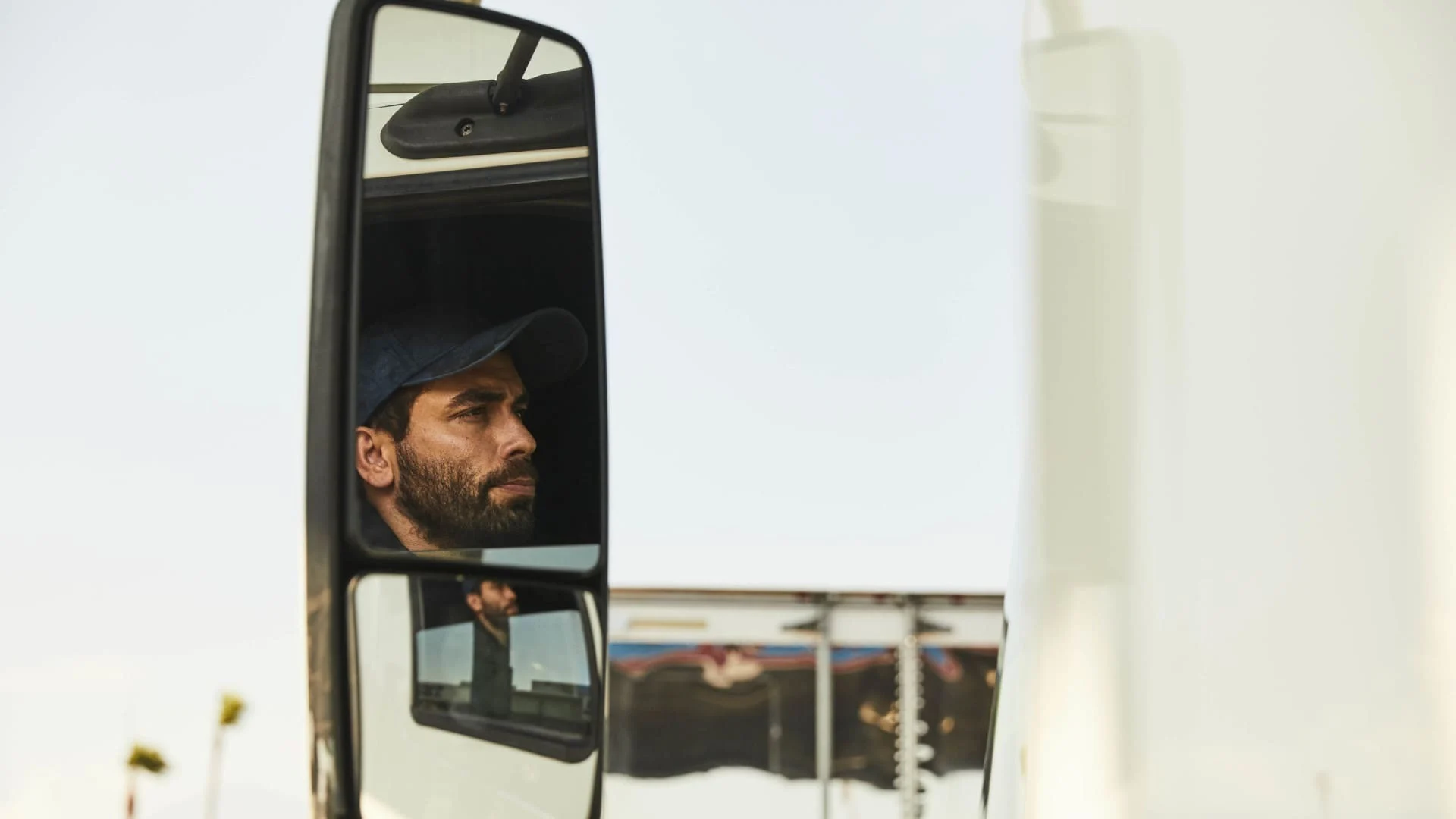 Man in review mirror.