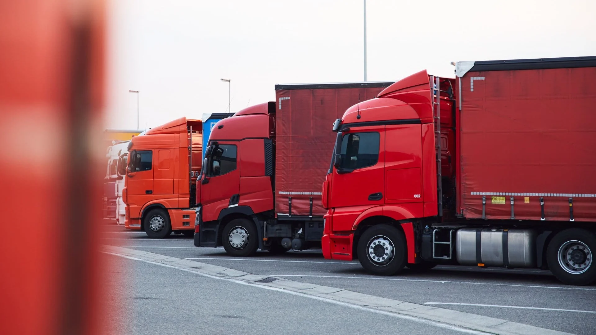 Row of red trucks.