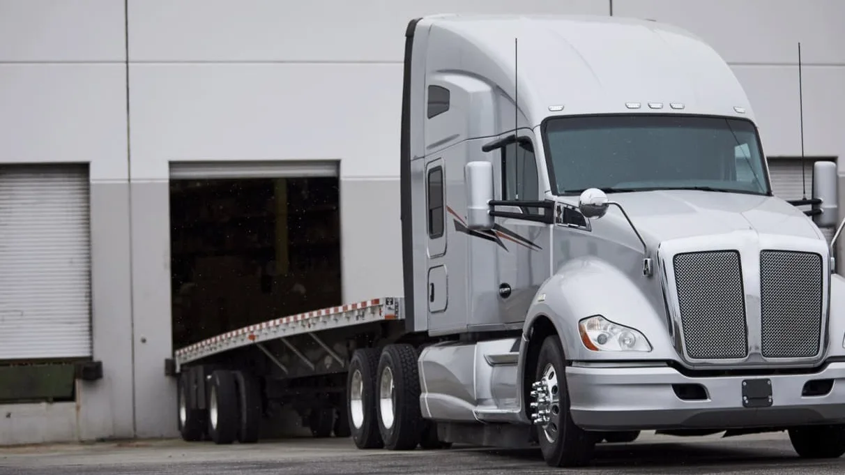 Truck backed up to loading dock.