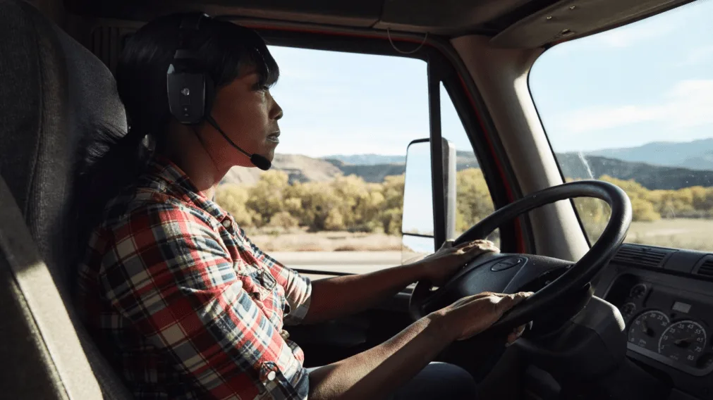 Woman driving a truck.