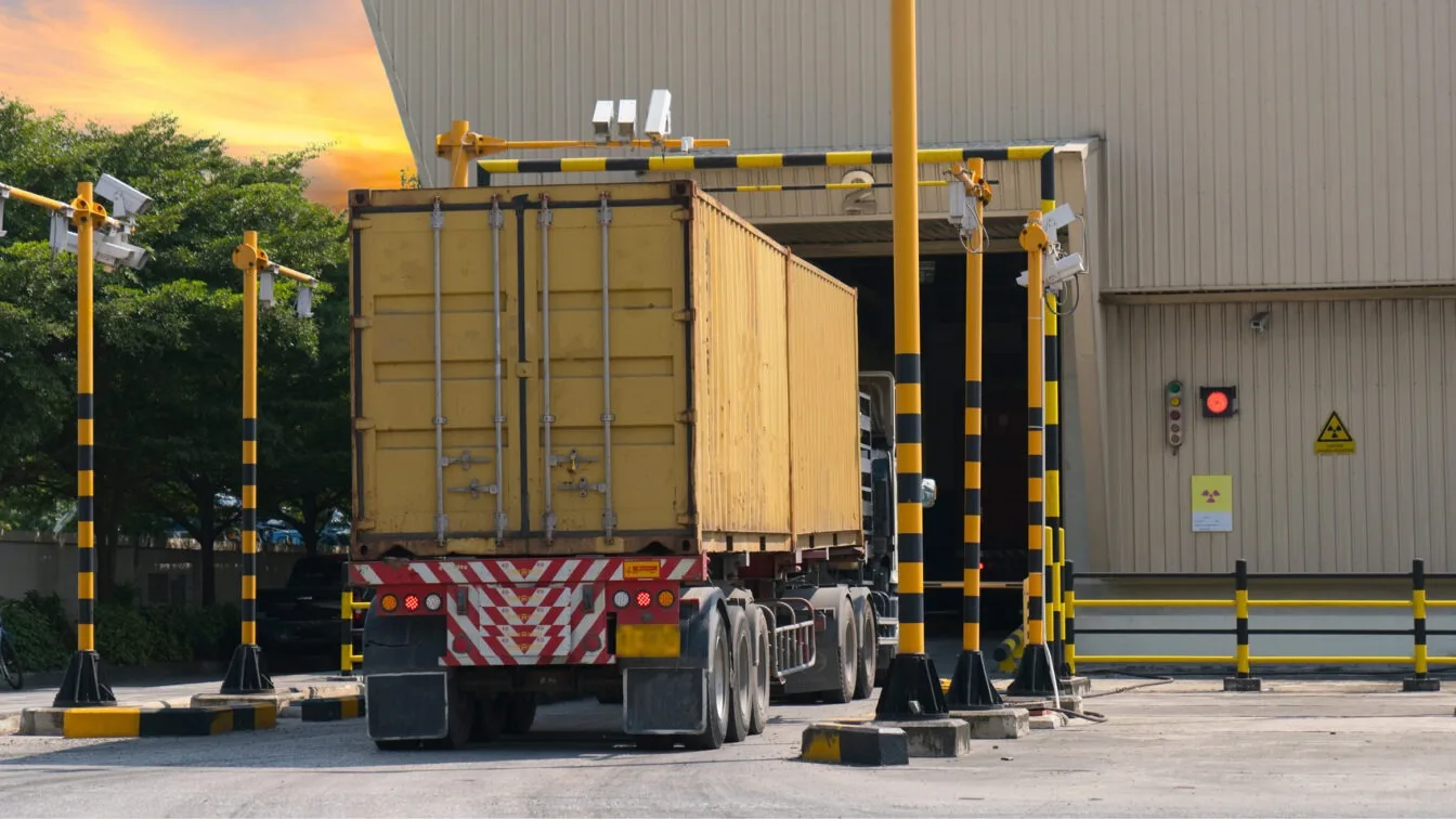 Truck parked at loading dock.