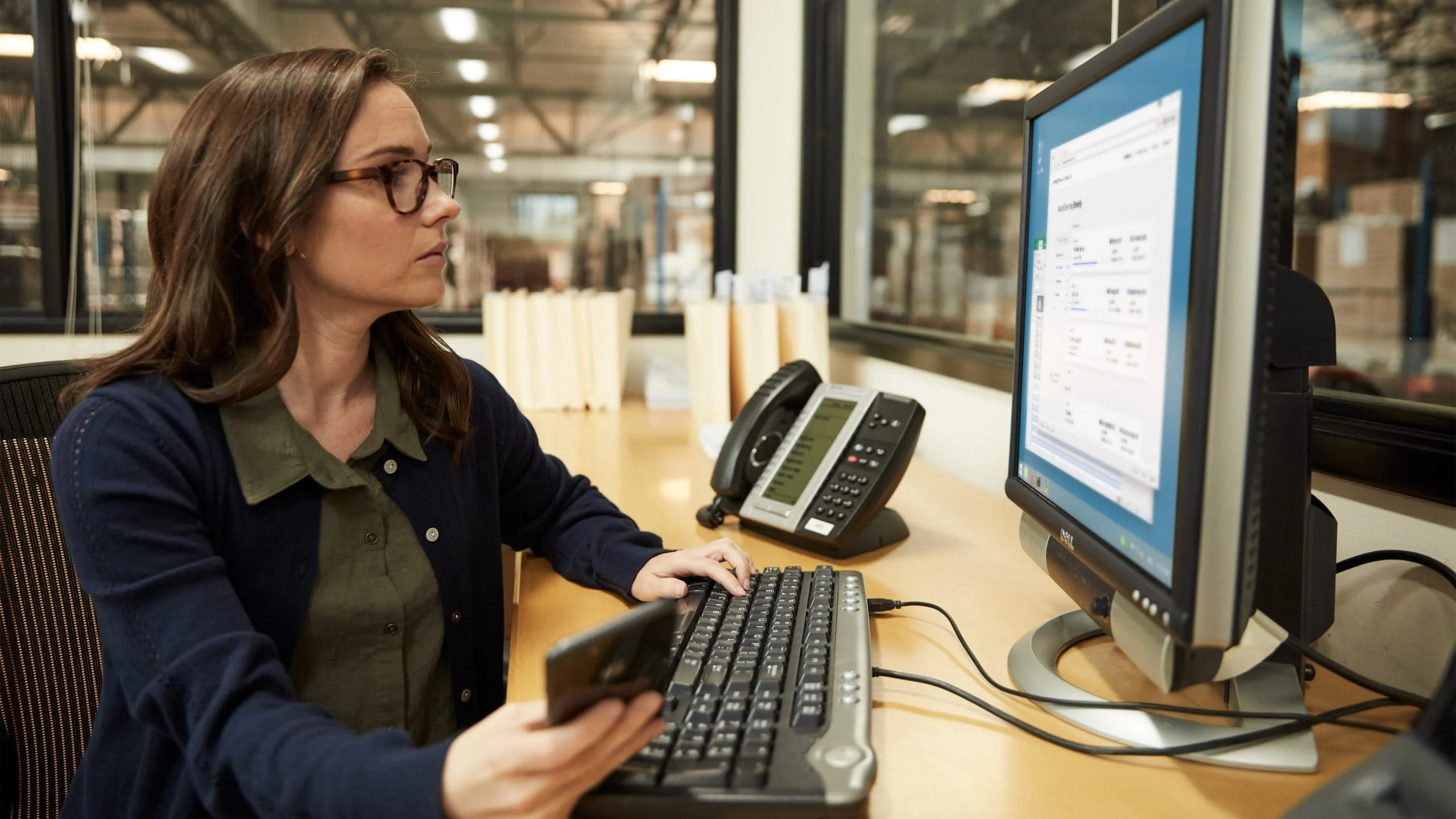 Woman looking at computer.