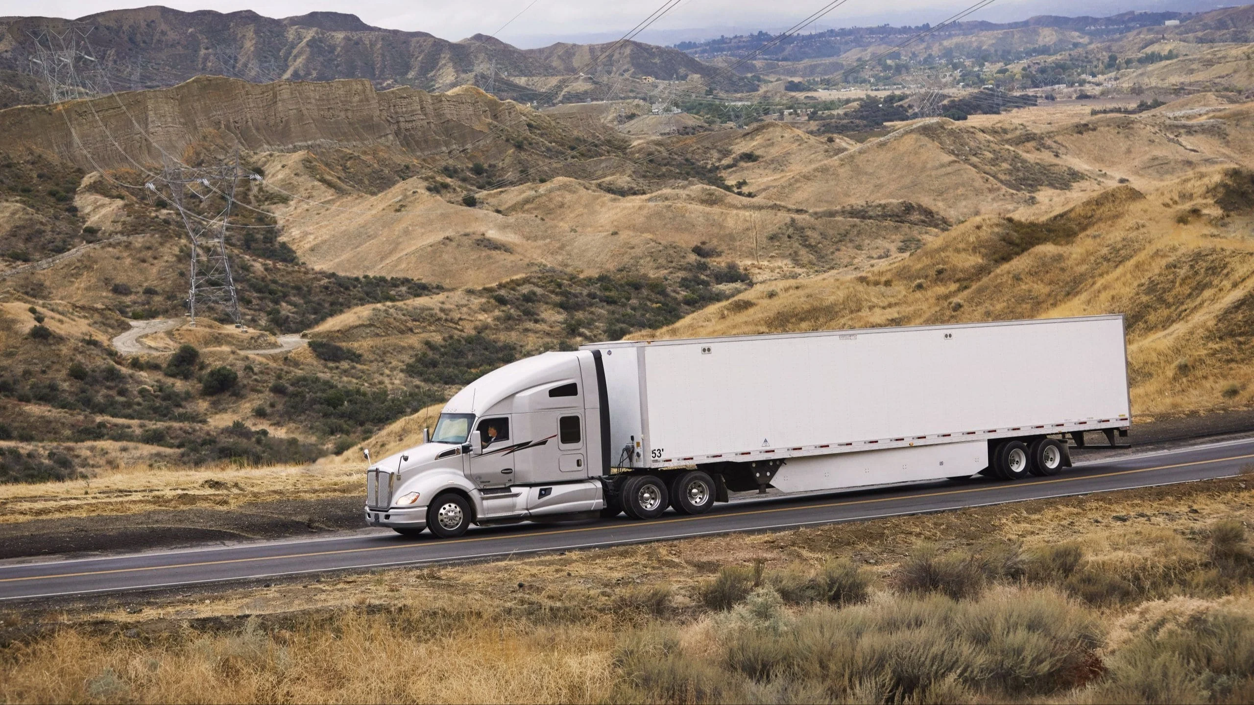 White truck on the road.