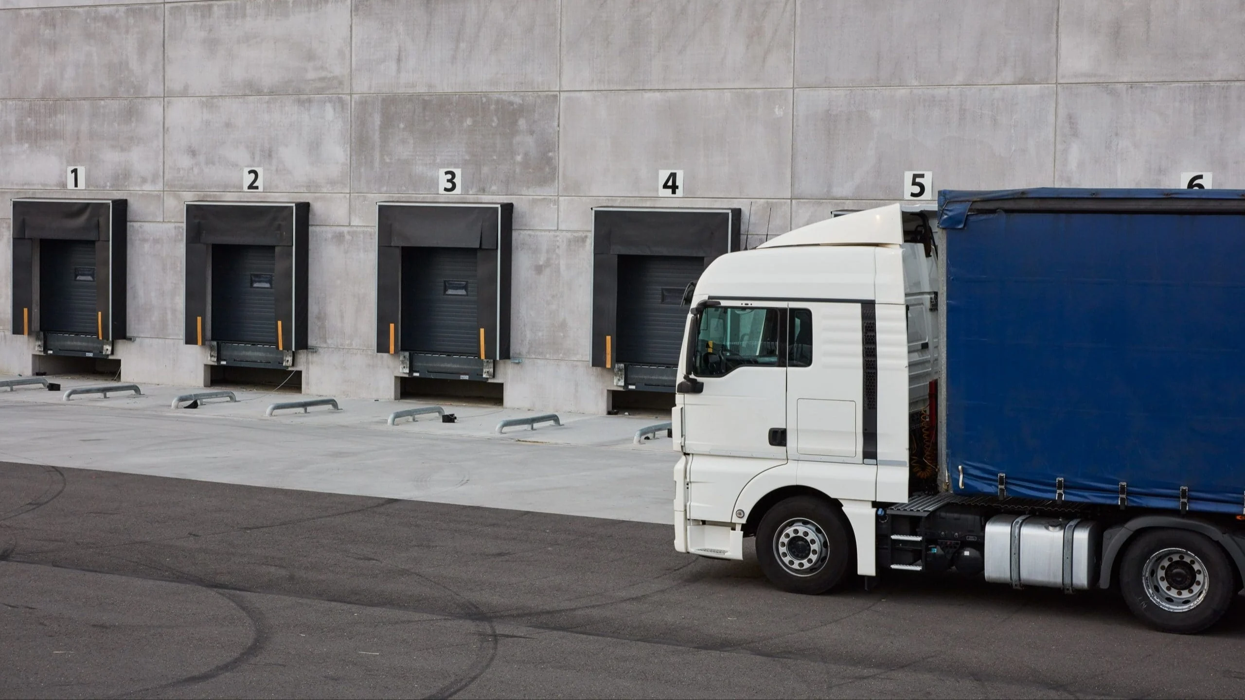 Truck parked near loading docks.