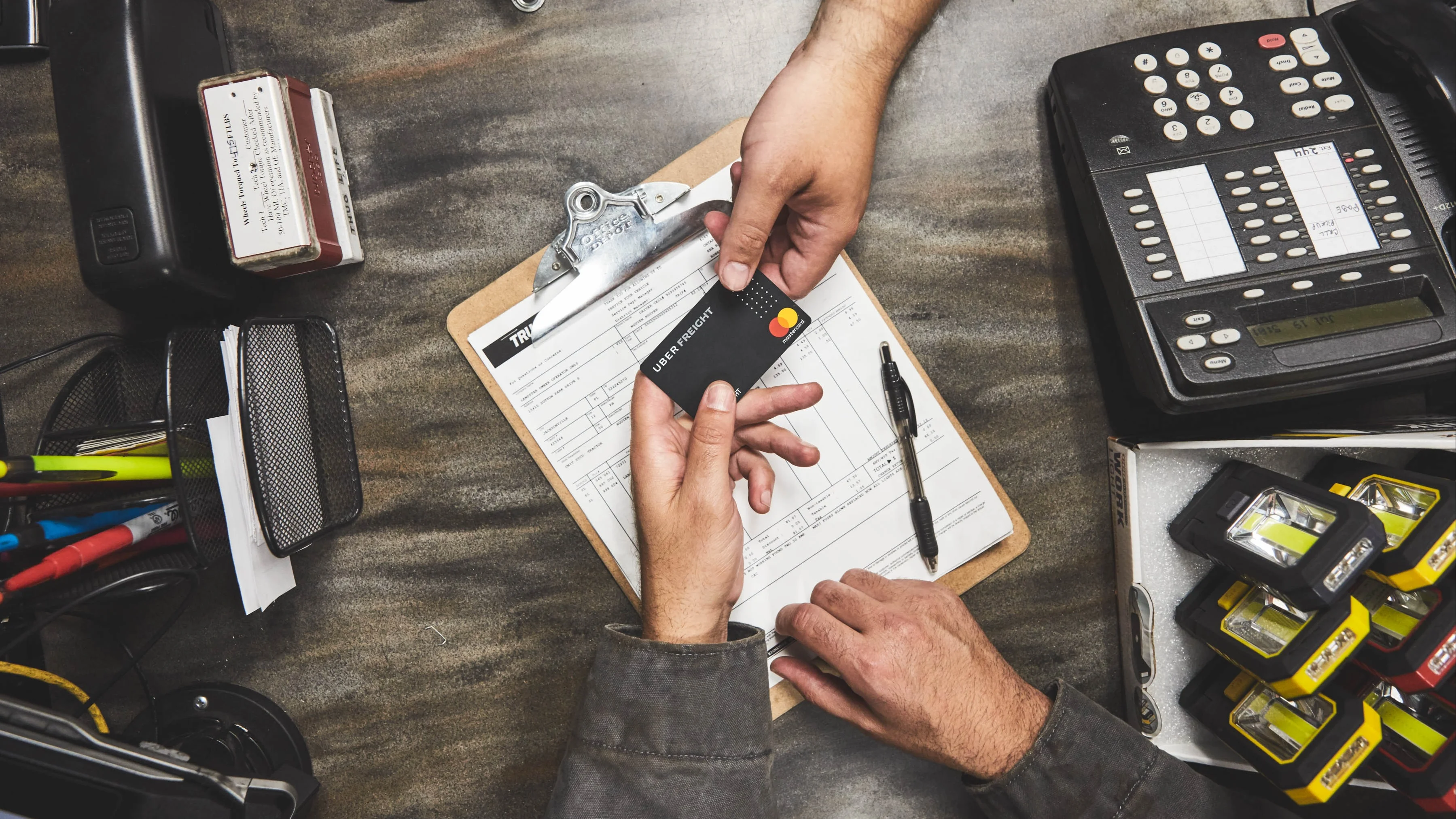 Man putting gas in truck.
