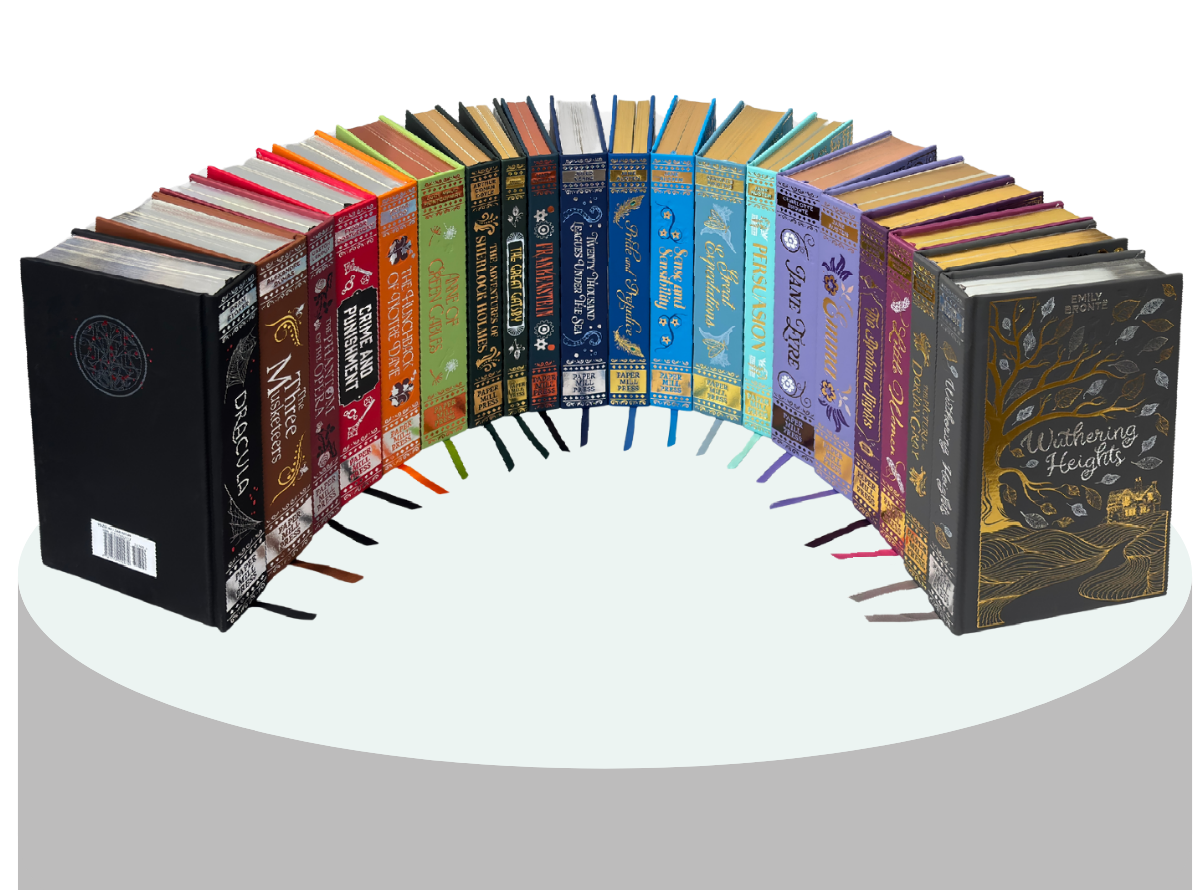 The Prestige Collection books by Paper Mill Press arranged in dramatic semicircle on white platform. Elegant hardcover classics including Wuthering Heights and other literary titles with ornate decorative covers in rich colors - black, red, green, blue, and purple spines.