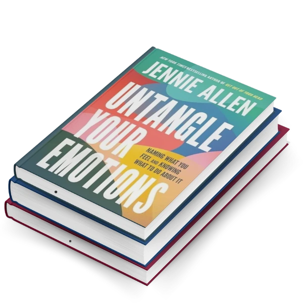 Untangle your emotions book with colorful cover stacked on multi-colored spined books. Attractive display featuring religion and spirituality title