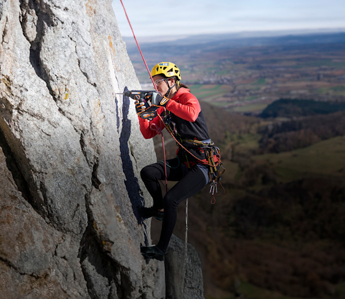 Girl climbing a mountain 