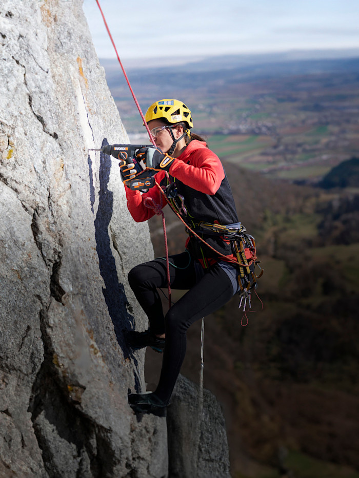 Girl climbing a mountain