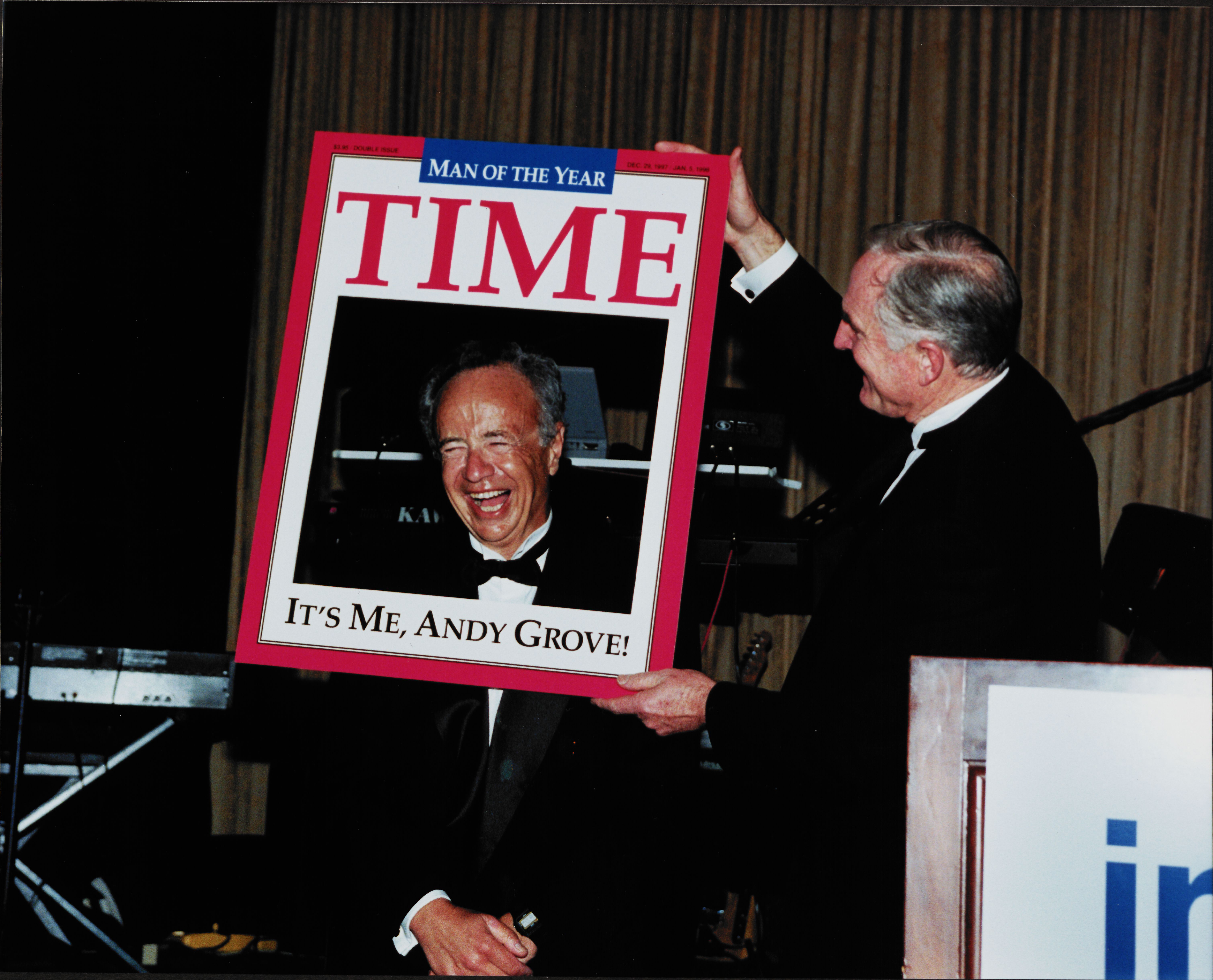 Future CEO Craig Barrett helped Andy Grove celebrate his accomplishment at an Intel party. 