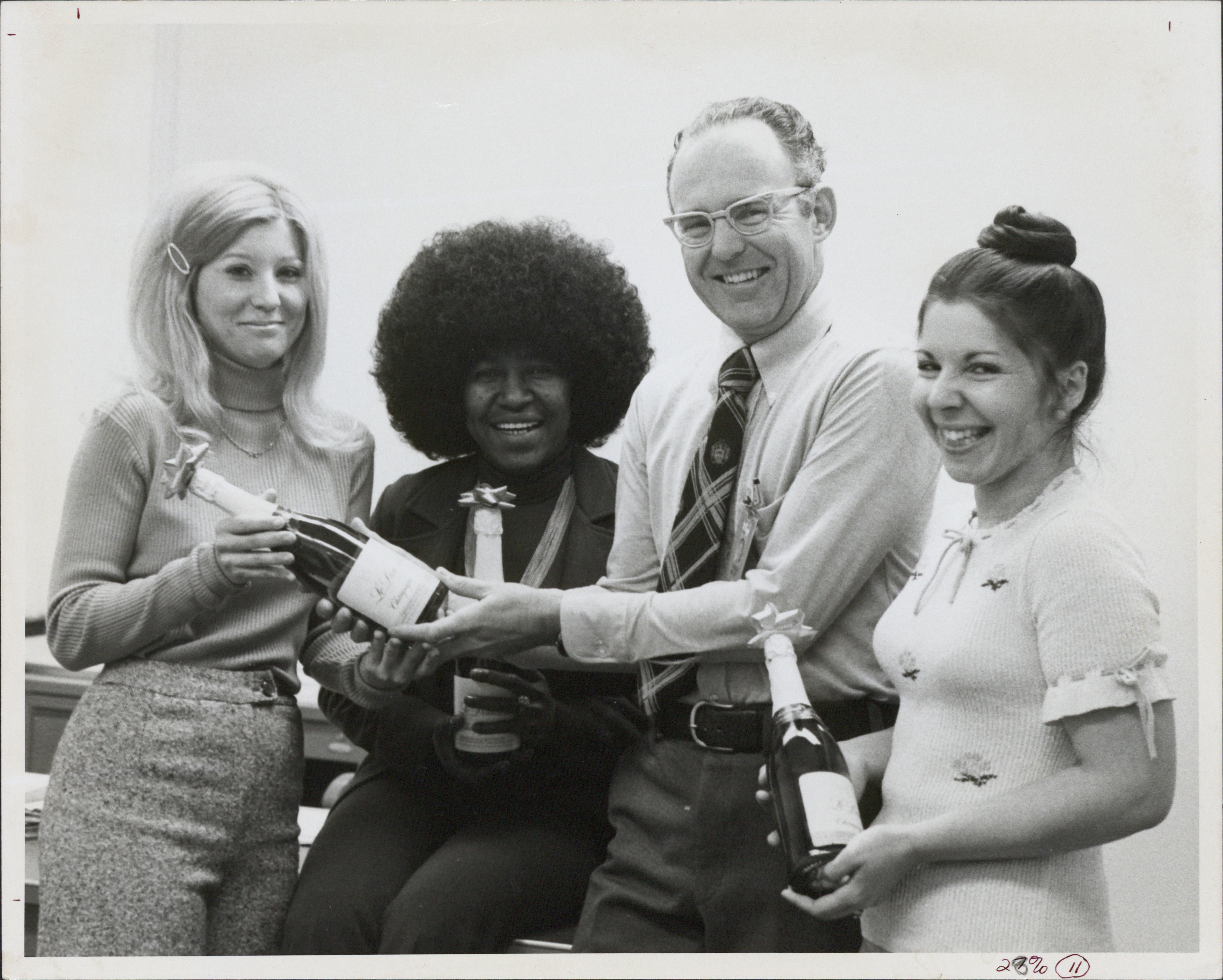 Gordon Moore (second from the right) and other employees celebrate the launch of the 1103 DRAM.