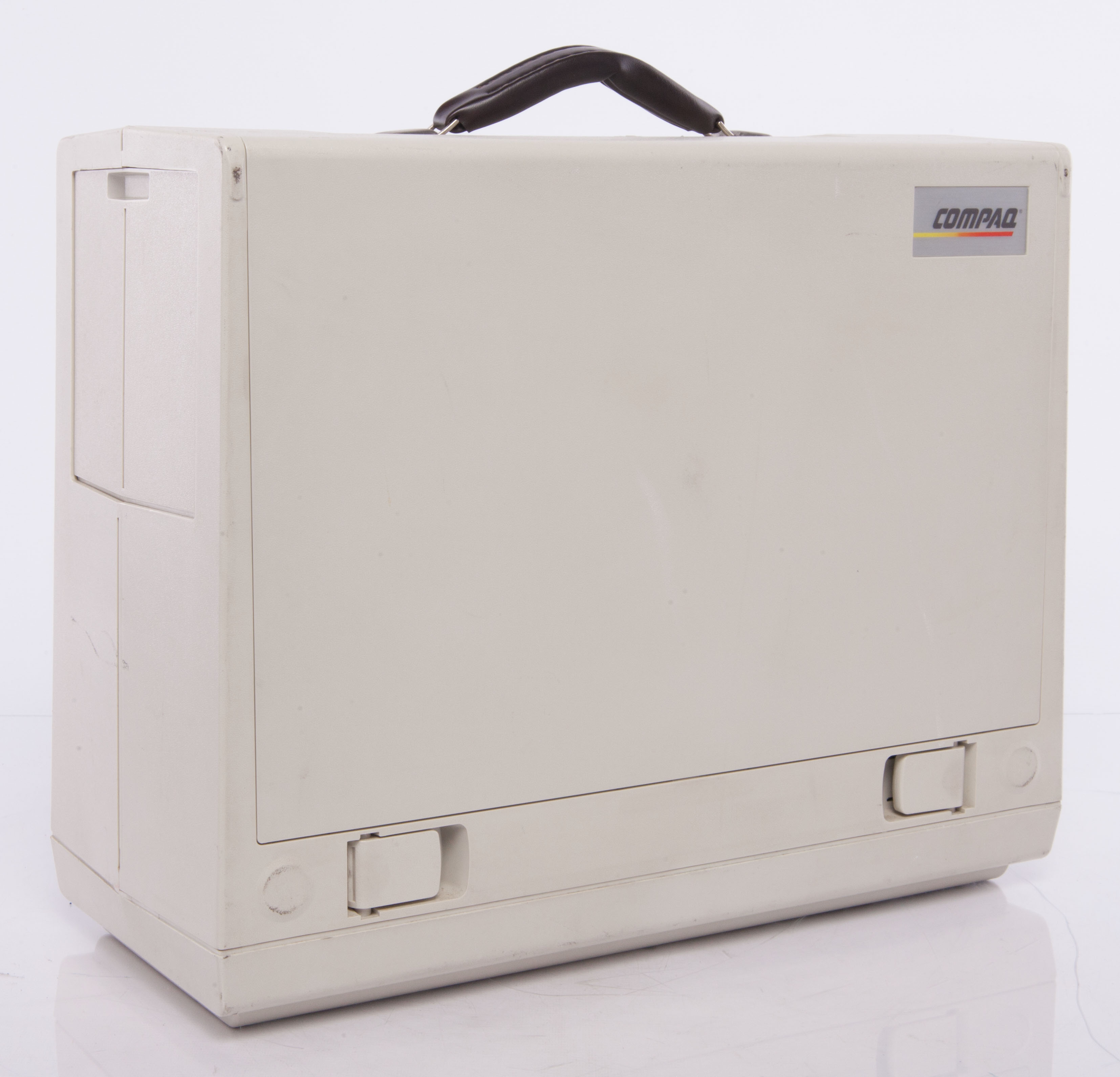 The Compaq Portable was what was known as a "luggable" computer: It was easily transportable, but lacked an independent power supply and needed to be plugged in to work. 
