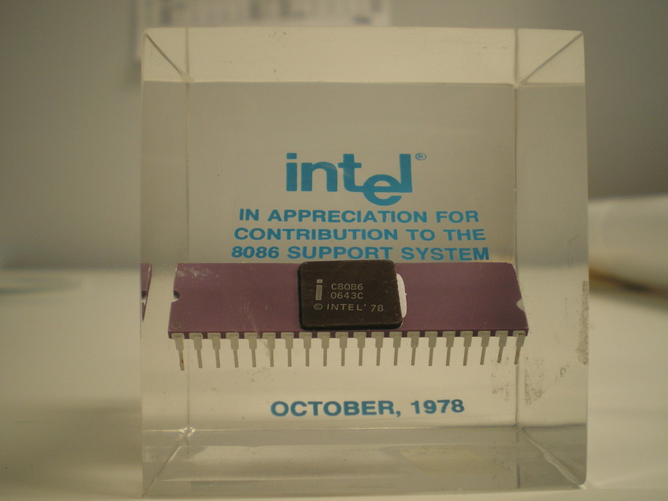 A defining strength of the 8086 was the support products and tools Intel developed to help customers use the chip. This acrylic paperweight commemorated the efforts of those who worked on those support products. 