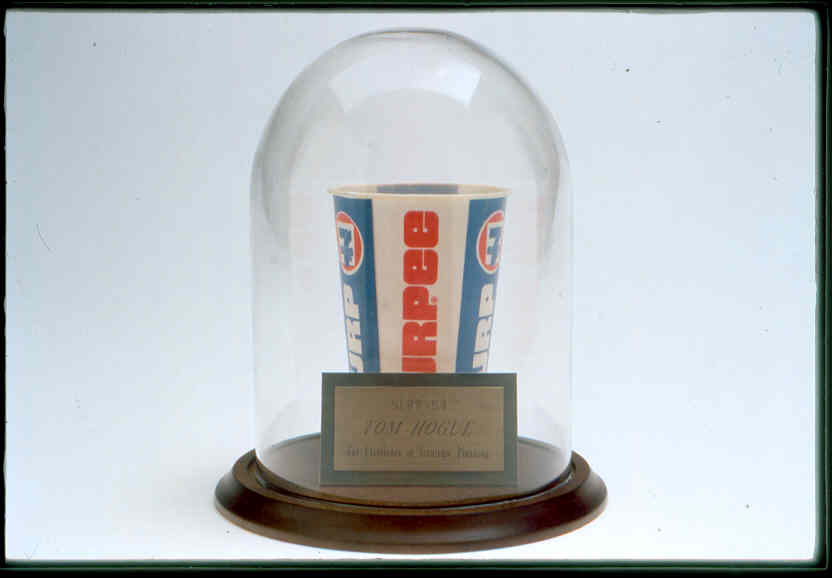 In the early years of the SLRPy, winners only received a cup. But as time passed and the award gained cachet, glass covers and plaques came in, adding a touch of prestige to go with the award's playfulness. 