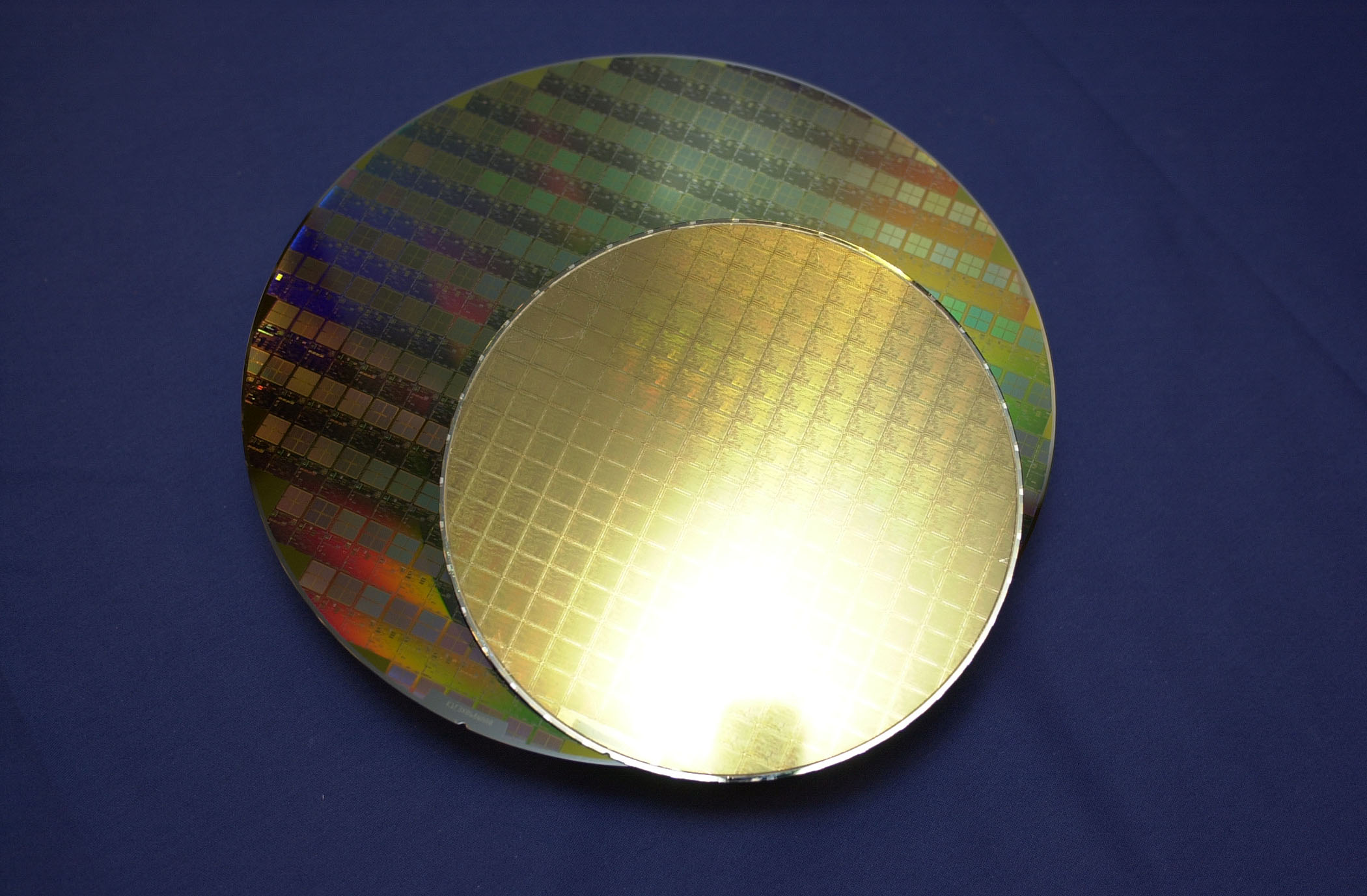 A 300mm wafer compared with a 200mm one.