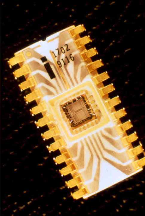 EPROM could be programmed electronically, which was much faster than building the programming into the physical architecture of a chip. EPROM could also be erased and reused by shining an ultraviolet light thorugh the small window in the top of the package, so it was cost-effective as well as convenient.   

