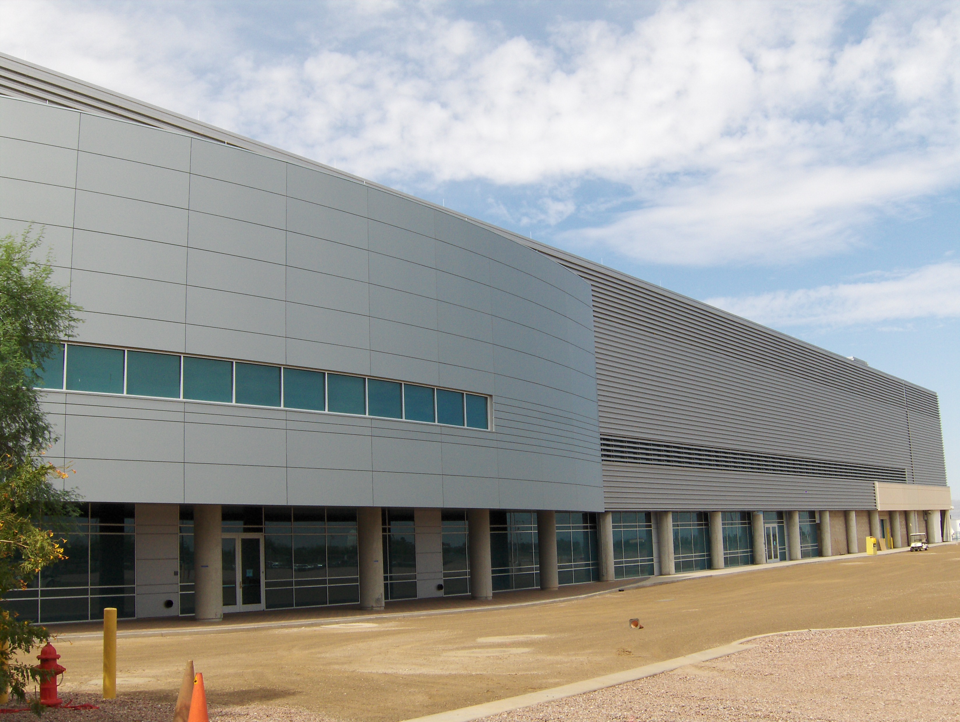 The new 45nm process was the first in Intel's new "tick-tock" strategy. It proposed that with every advancement in microarchitecture, there would be a die shrink of the process technology. The result would be a new silicon process technology approximately every two years. As part of that plan, Intel unveiled plans for a $3.5 billion high-k and metal gate fab facility in Chandler, Ariz. — Fab 32 — in July 2005, 18 months before the company even announced its first successful prototype of the new technology. A complementary $3.5 billion facility in Kiryat Gat, Israel, was announced in December 2005.