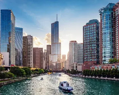 A view of a city with boats in water.