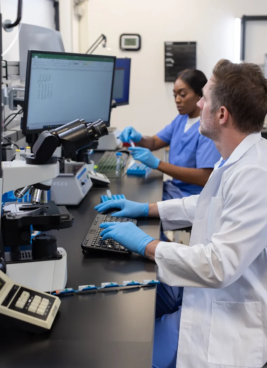 Two people working in a California Cryobank lab.