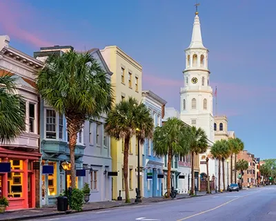A view of buildings lining a city street.