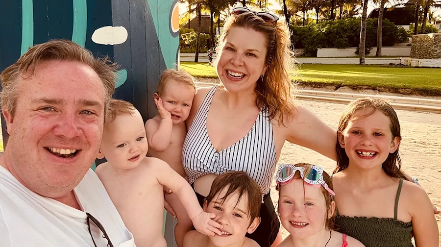 A photo of Eloise and Jack with family.