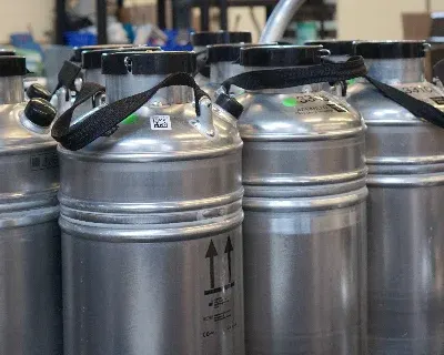 A group of metal containers organized.