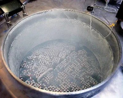 An open tank of vials in a lab setting.